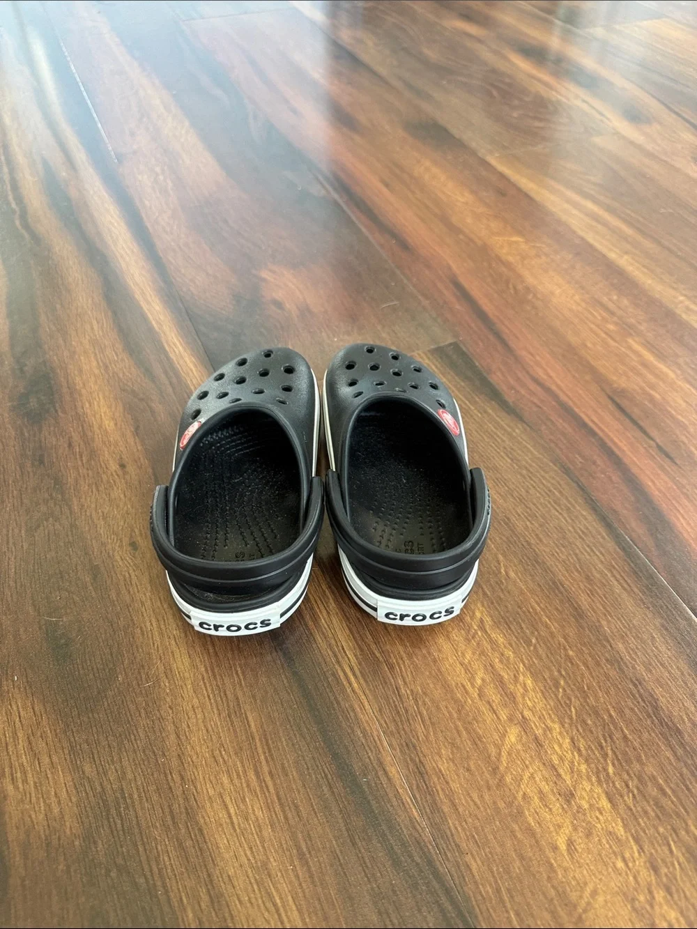 CROCS Kids Black Clog with White Trim and Red Logo